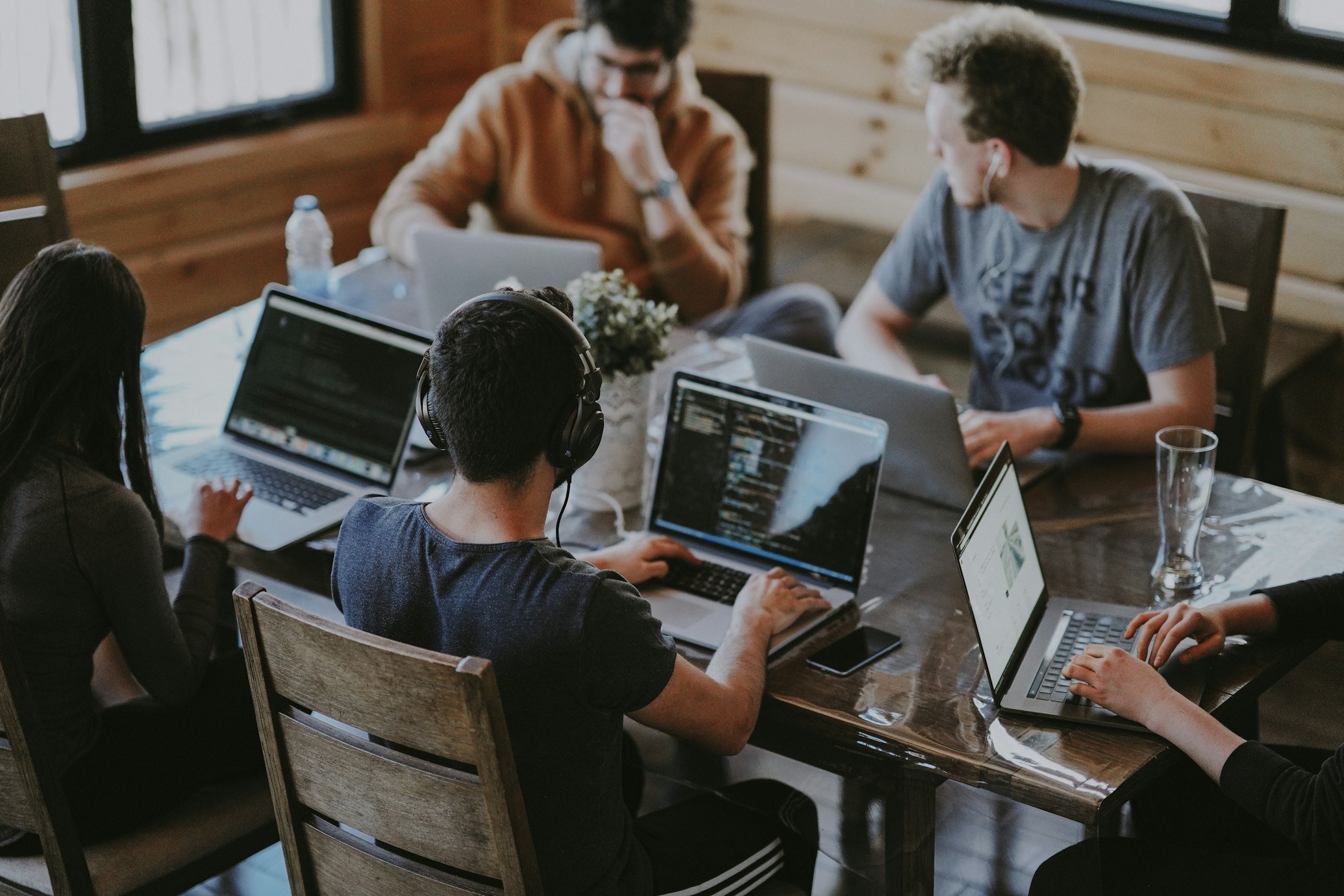 Professional team collaborating on software development